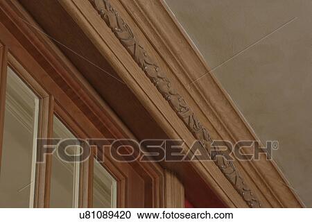 Stock Image - ARCHITECTURAL TRIM: detail ornate crown molding. Fotosearch