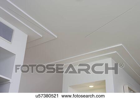 ARCHITECTURAL TRIM: plaster crown molding surrounding built in display shelves, simple minimal lines, View Large Photo Image Stock Image - ARCHITECTURAL TRIM: plaster crown molding surrounding built in display shelves, simple minimal lines,. Fotosearch