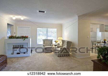 Armchairs in corner of traditional living room View Large Photo Image Stock Image - Armchairs in corner of traditional living room. Fotosearch