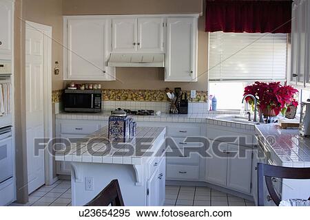 Average white kitchen; Trabuco Canyon; California; USA View Large Photo Image Stock Photography - Average white kitchen; Trabuco Canyon; California; USA. Fotosearch