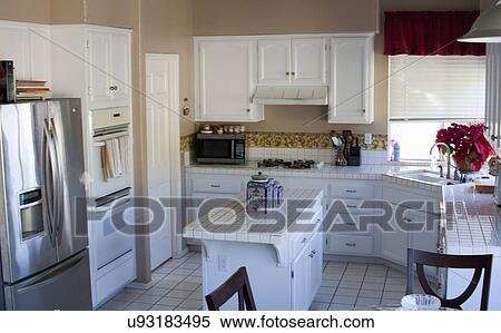 Stock Photography - Average white kitchen; Trabuco Canyon; California; USA. Fotosearch