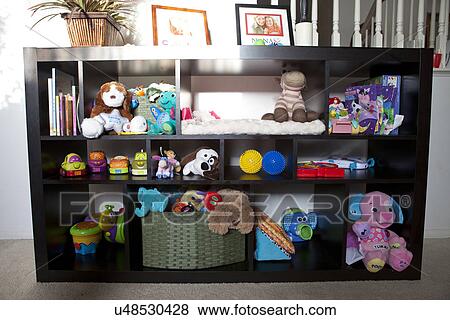 Baby toys on shelves; Trabuco Canyon; California; USA View Large Photo Image Stock Photo - Baby toys on shelves; Trabuco Canyon; California; USA. Fotosearch