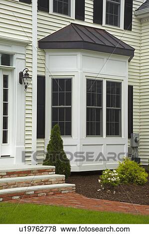 Stock Photo - Back yard entrance of single family home. Fotosearch
