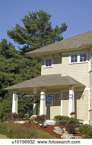 Stock Image - Back yard garden of single family home. Fotosearch