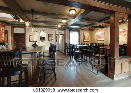 Stock Photo - Bar and dining area in restaurant, Ojo Caliente, New Mexico, USA. Fotosearch