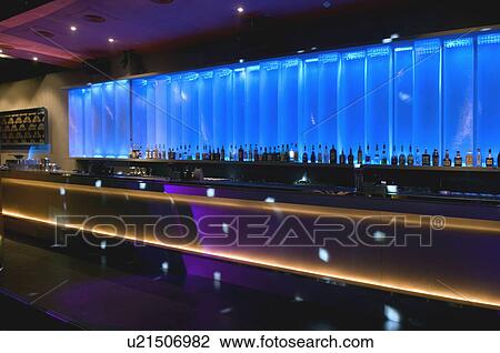 Stock Image - Bar inside modern nightclub. Fotosearch
