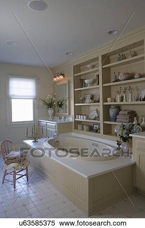 Bathroom Cottage Chic Vintage Vases And Plates On Wainscot Shelving Behind Bathtub Soft Taupe Colors Pink Weathered Childs Chair Holds Towels