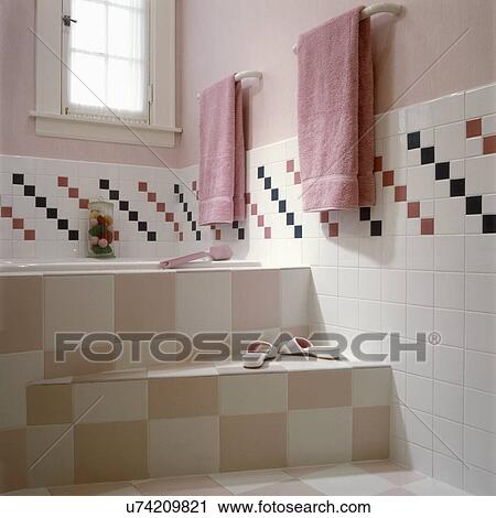 BATHROOMS - Contemporary bath, pale pink and white tiled steps to bath, partial tiled wall with checkered pattern, pale pink walls, pink towels on racks, View Large Photo Image Stock Image - BATHROOMS - Contemporary bath, pale pink and white tiled steps to bath, partial tiled wall with checkered pattern, pale pink walls, pink towels on racks,. Fotosearch