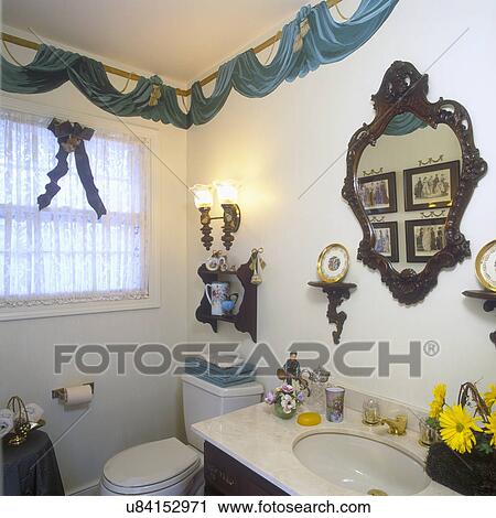 BATHROOMS: Painted drape border. Mirror. Wall shelves. Lace. View Large Photo Image Stock Image - BATHROOMS: Painted drape border. Mirror. Wall shelves. Lace.. Fotosearch