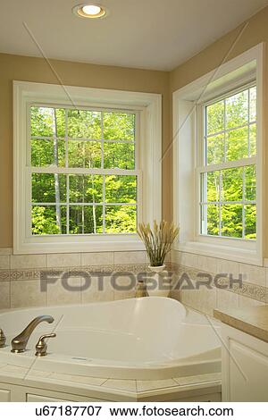 Bathtub in domestic bathroom View Large Photo Image Stock Photo - Bathtub in domestic bathroom. Fotosearch