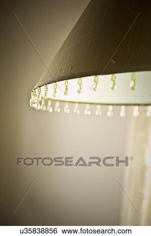 Stock Photograph - Bead detail on lamp shade; Carpinteria; California; USA. Fotosearch