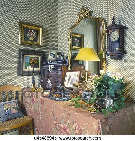 Bedrooms View Of Vanity Area In A Cozy Bedroom Skirted Vanity Glit Mirror Wall Paper Antiques Dressing Table Covered In Floral Terracotta