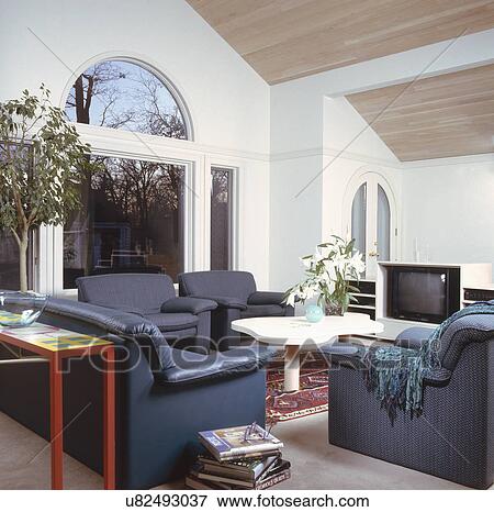 Stock Photo - Blue furniture in contemporary living room. Fotosearch