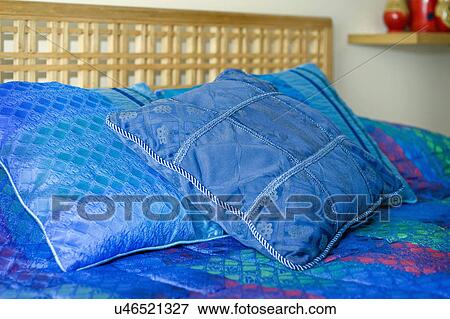 Blue throw pillows on bed; Italy View Large Photo Image Stock Photo - Blue throw pillows on bed; Italy. Fotosearch