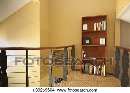 Picture - Bookcase in upstairs hallway; Burbank; California; USA. Fotosearch