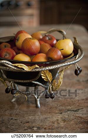 Bowl of apples on granite countertop; Irvine; California; USA View Large Photo Image Picture - Bowl of apples on granite countertop; Irvine; California; USA. Fotosearch