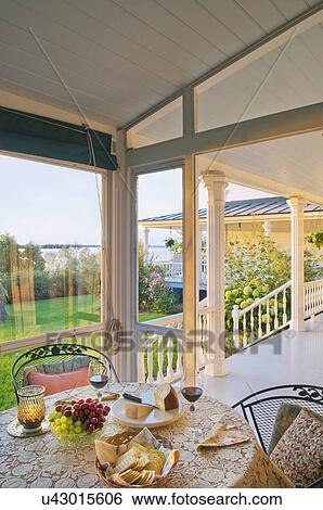 Breakfast set on front porch, Grand Isle, Vermont, USA View Large Photo Image Stock Photograph - Breakfast set on front porch, Grand Isle, Vermont, USA. Fotosearch