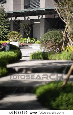 Stock Photography - Building in front of garden. Fotosearch
