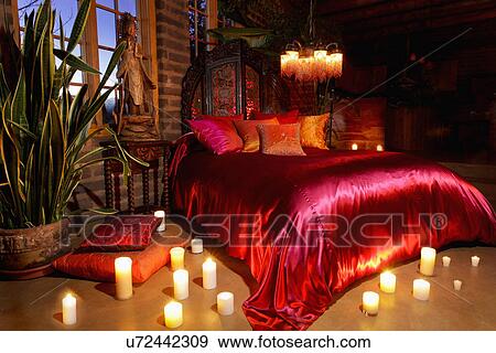 Candles surrounding orange and red bed, Santa Fe, New Mexico, USA View Large Photo Image Stock Photo - Candles surrounding orange and red bed, Santa Fe, New Mexico, USA. Fotosearch