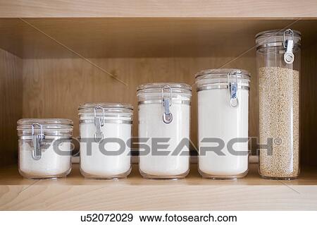 Canisters Lined On Countertop San Diego California Usa Stock