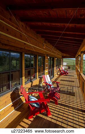 Chairs on porch with wood paneled floor View Large Photo Image Stock Photography - Chairs on porch with wood paneled floor. Fotosearch