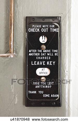 Check out instructions for hotel on door, Ojo Caliente, New Mexico, USA View Large Photo Image Stock Photo - Check out instructions for hotel on door, Ojo Caliente, New Mexico, USA. Fotosearch