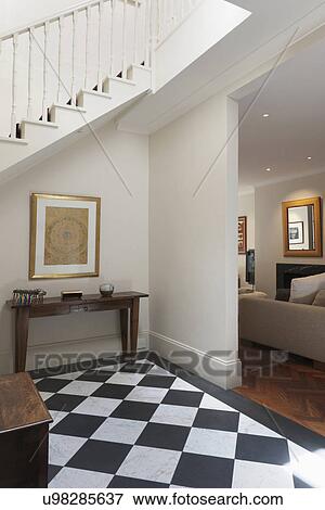 Stock Photo - Checkered floor in entrance hall. Fotosearch