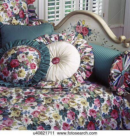 CHILDREN'S BEDROOM: Bed detail showing pink and white roses printed on pillows on daybed. View Large Photo Image Stock Image - CHILDREN'S BEDROOM: Bed detail showing pink and white roses printed on pillows on daybed.. Fotosearch