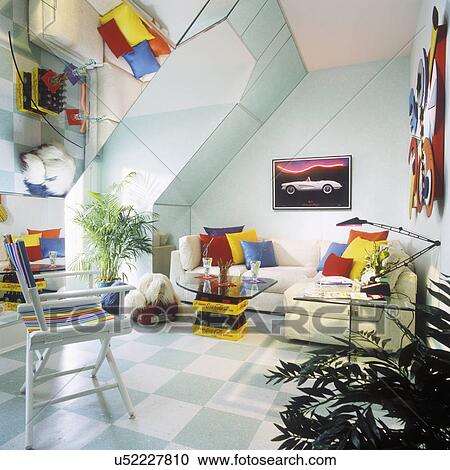 CHILDREN'S BEDROOM: Boy's attic bedroom with aqua and white checkered floor. Framed car poster. 'L' shaped white sofa with multi colored pillows. Coco-Cola glass coffee table. Sheep dog. View Large Photo Image Stock Image - CHILDREN'S BEDROOM: Boy's attic bedroom with aqua and white checkered floor. Framed car poster. 'L' shaped white sofa with multi colored pillows. Coco-Cola glass coffee table. Sheep dog.. Fotosearch