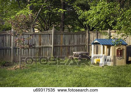 Children's playhouse and table in backyard; Potomac; Maryland; USA View Large Photo Image Stock Photography - Children's playhouse and table in backyard; Potomac; Maryland; USA. Fotosearch