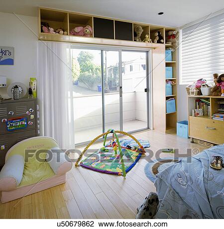 Children's toys and cubbies in bedroom View Large Photo Image Stock Image - Children's toys and cubbies in bedroom. Fotosearch