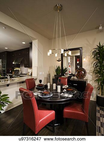 Circular dining table with red leather chairs; Aliso Viejo; California; USA View Large Photo Image Stock Photo - Circular dining table with red leather chairs; Aliso Viejo; California; USA. Fotosearch