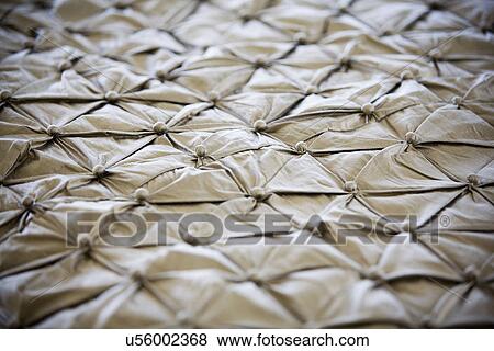 Stock Photo - Close up detail contemporary satin bedspread; Aliso Viejo; California; USA. Fotosearch