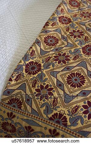 Stock Photo - Close-up of a blanket on bed. Fotosearch