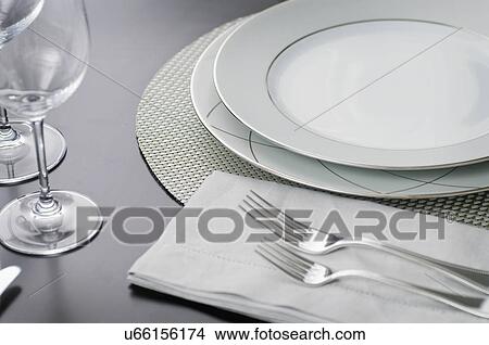Close-up of an elegant place setting on dining table View Large Photo Image Picture - Close-up of an elegant place setting on dining table. Fotosearch