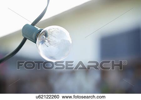 Close-up of light bulb View Large Photo Image Stock Image - Close-up of light bulb. Fotosearch