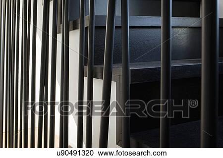 Close-up of staircase with poles as handrail View Large Photo Image Stock Image - Close-up of staircase with poles as handrail. Fotosearch