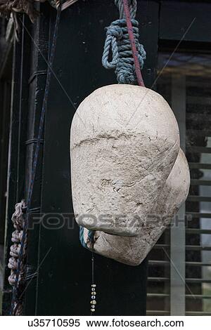 Close-up of white abandoned fishing floats hanging by rope View Large Photo Image Stock Photography - Close-up of white abandoned fishing floats hanging by rope. Fotosearch