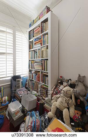 Stock Photo - Cluttered room in traditional home; Sydney; Australia. Fotosearch