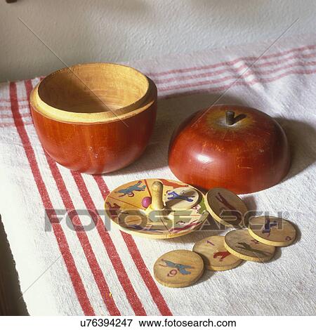 COLLECTION DISPLAY - Apple shaped wooden boxes contained tiny games. Sized 1 to 4 inches, graduated sets, Japan and Germany 1940-50s. View Large Photo Image Stock Photo - COLLECTION DISPLAY - Apple shaped wooden boxes contained tiny games. Sized 1 to 4 inches, graduated sets, Japan and Germany 1940-50s.. Fotosearch