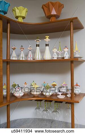 Stock Photo Of Collection Display Mid Century Modern Open Shelving Collection Display Mid Century Modern Open Shelving In Kitchen Red Wing Pottery Vases On Top Anese Holt Howard Novelty Condiment Containers