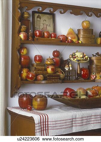 COLLECTION DISPLAY - Originally made as play things vintage wooden apples made in Germany and Japan in 1940's-1950's grouped on shelves and table. View Large Photo Image Stock Photograph - COLLECTION DISPLAY - Originally made as play things vintage wooden apples made in Germany and Japan in 1940's-1950's grouped on shelves and table. . Fotosearch