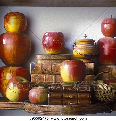 Stock Photography - COLLECTION DISPLAY - Vintage wooden apples made in Japan and Germany during 1940's and 1950's were sold in nesting sets of four and five.. Fotosearch