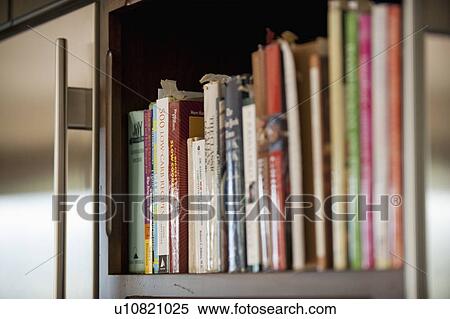 Collection of cookbooks on kitchen shelf; Irvine; California; USA View Large Photo Image Stock Photography - Collection of cookbooks on kitchen shelf; Irvine; California; USA. Fotosearch