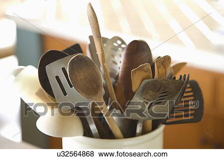 Collection of kitchen utensils in large canister; Carpinteria; California; USA View Large Photo Image Stock Photo - Collection of kitchen utensils in large canister; Carpinteria; California; USA. Fotosearch