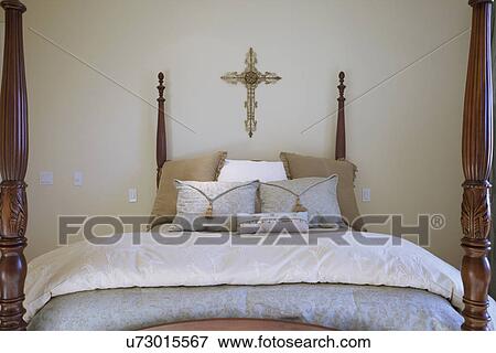 Collection of throw pillows on four-poster bed in bedroom, Laguna Beach, California, USA View Large Photo Image Stock Photo - Collection of throw pillows on four-poster bed in bedroom, Laguna Beach, California, USA. Fotosearch
