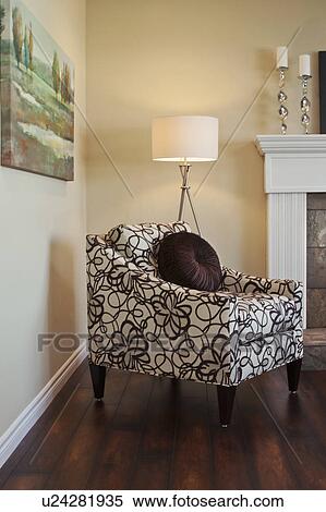 Comfortable chair on hardwood floor in living room, California, USA View Large Photo Image Stock Photography - Comfortable chair on hardwood floor in living room, California, USA. Fotosearch