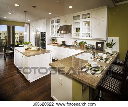 Contemporary kitchen with white cabinets; Aliso Viejo; California; USA View Large Photo Image Stock Image - Contemporary kitchen with white cabinets; Aliso Viejo; California; USA. Fotosearch