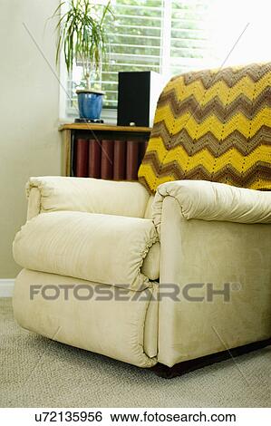 Cozy armchair with throw blanket, San Diego, California, United States of America View Large Photo Image Stock Photograph - Cozy armchair with throw blanket, San Diego, California, United States of America. Fotosearch