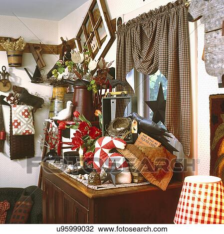 Creative collectibles displayed on sideboard in house View Large Photo Image Stock Image - Creative collectibles displayed on sideboard in house. Fotosearch